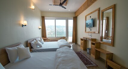 Samrat Inn Room Type - Deluxe Family Room
