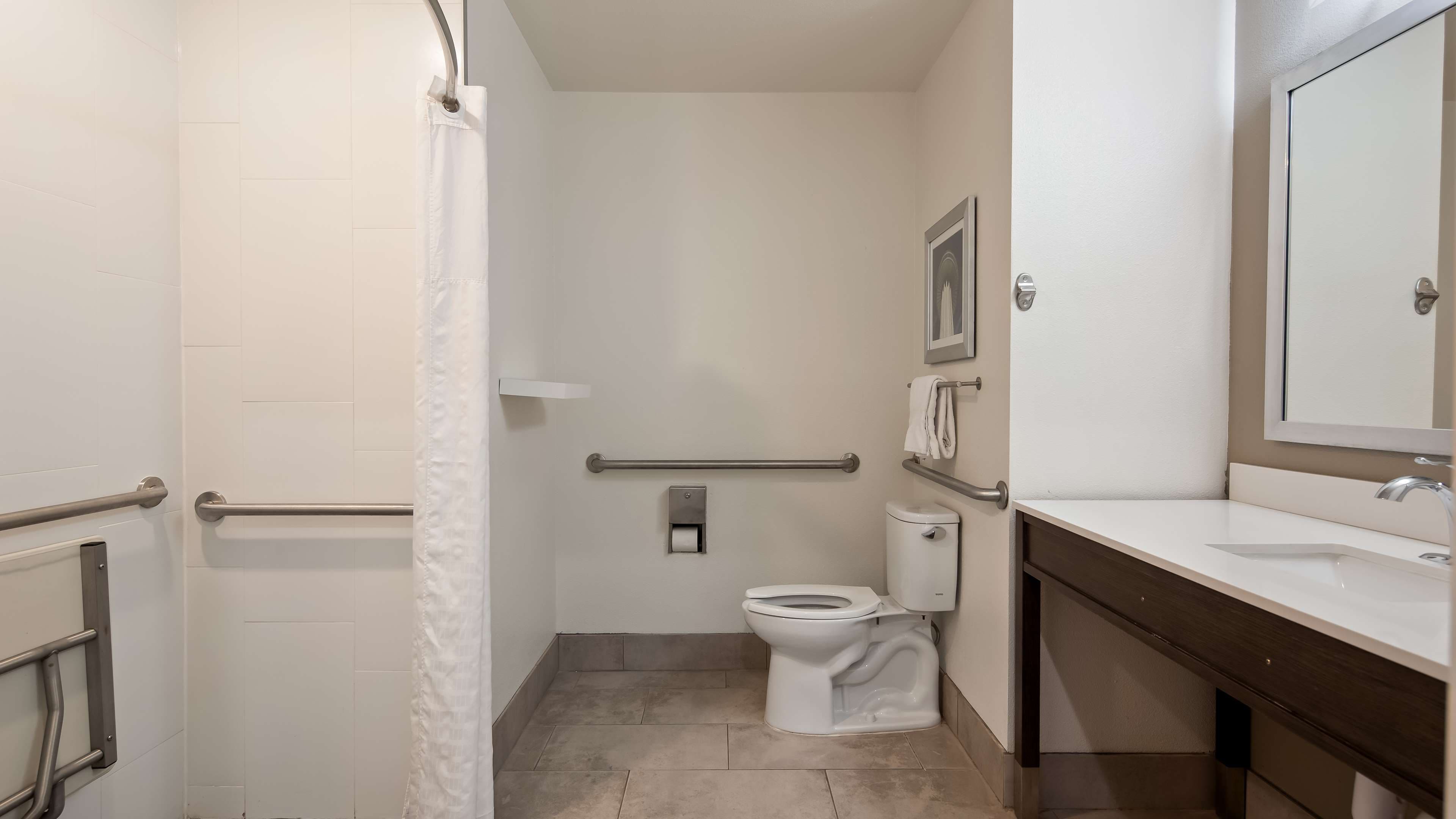 Best Western Plus Roland Inn & Suites - Tap to explore photos