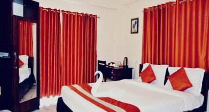 Ashraya Residency Room Type - AC Deluxe Room