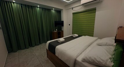 MAHADEVA RESIDENCY Room Type - Deluxe Room with Balcony