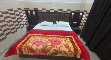 KESAR RESIDENCY Room Type - Deluxe Double KESAR RESIDENCY Room Type - Deluxe Double