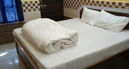 Fun Stay ( Hotel ) Room Type - Bedroom 1 with AC