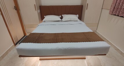 Nandhavanam A Business Class Residency Room Type - Twin Sharing -Double Bed Room