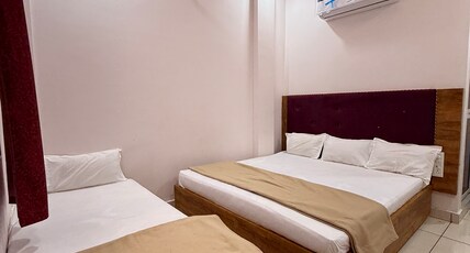 Hotel Koti Tirth Room Type - Deluxe Triple Room