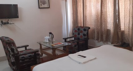 HOTEL AADDITAYAA INTERNATIONAL Room Type - Super Deluxe Room
