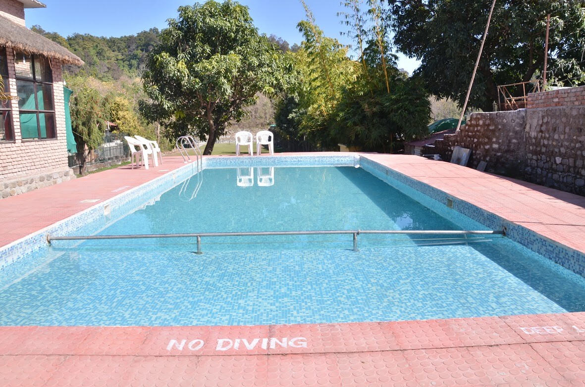 Corbett Call Resort- A River Access Property - Tap to explore photos
