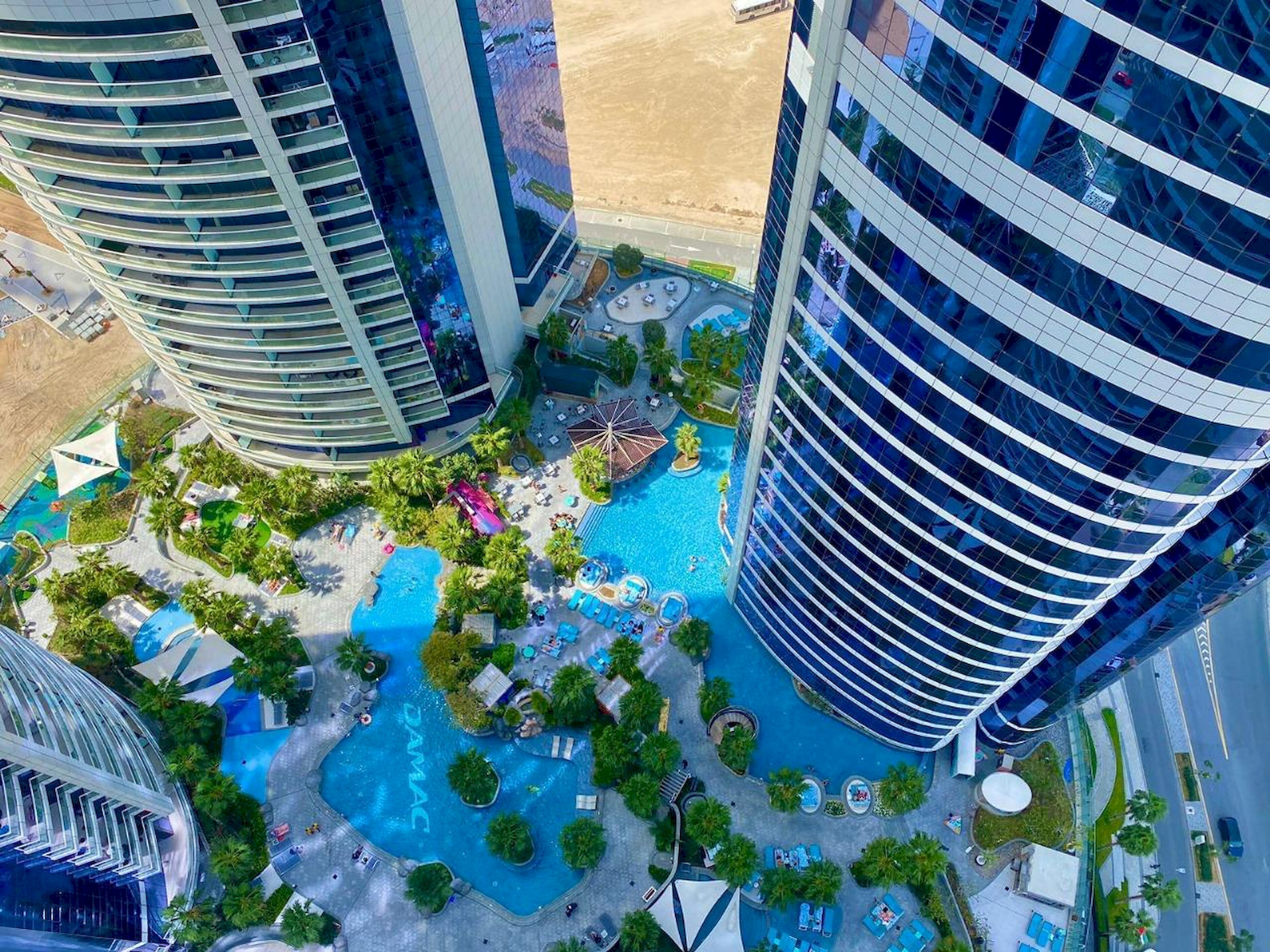 Luxury 1BR at Paramount Residences with Pool Gym & Parking - Tap to explore photos