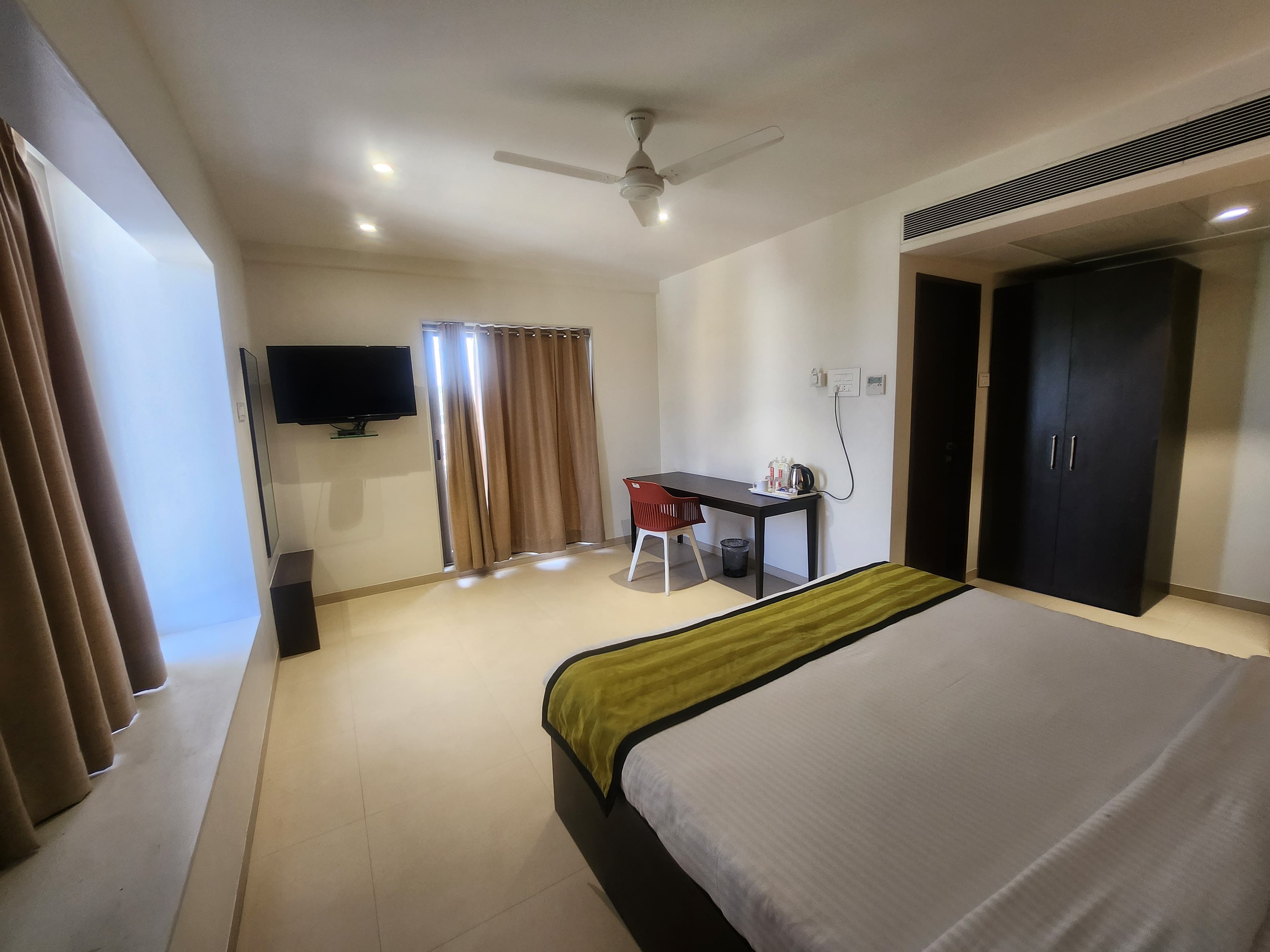 Freesia Residency by Express Inn - Tap to explore photos