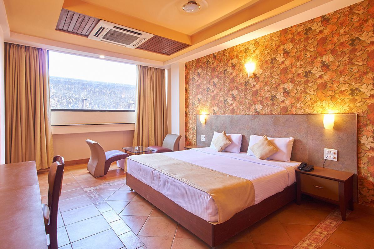 Goa Woodlands Hotel - Tap to explore photos