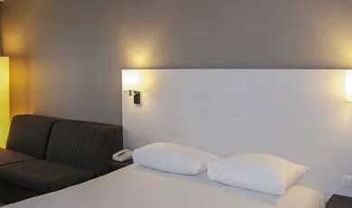 ibis Styles Lyon Sud Vienne Room Type - Family room with a double bed and a sofa bed for 2 children