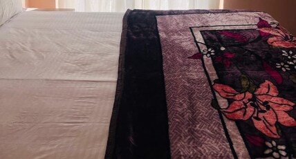 Homestay at Krishna Crest Omaxe Vrindavan Room Type - Bedroom 1
