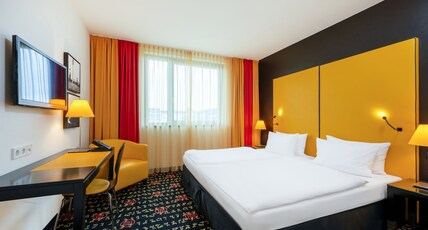 Holiday Inn Munich- Westpark Room Type - 2 Twin Standard Garden View Minifridge up to 3 Guests Holiday Inn Munich- Westpark Room Type - 2 Twin Standard Garden View Minifridge up to 3 Guests