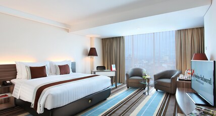 Swiss-Belhotel Makassar Room Type - Grand Deluxe Double City View Swiss-Belhotel Makassar Room Type - Grand Deluxe Double City View
