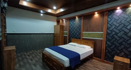 The Rain Tree Resort Room Type - Deluxe AC Room