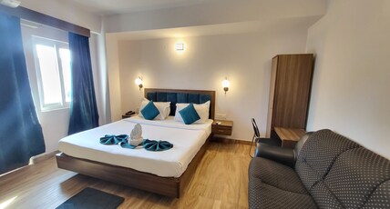Holy Basil Clark inn Room Type - Premium