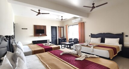 Hotel Sri Devi Room Type - Deluxe Family AC | 3 King Beds