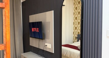Lusso stayz- Studio apartment with projector screen Room Type - Bedroom
