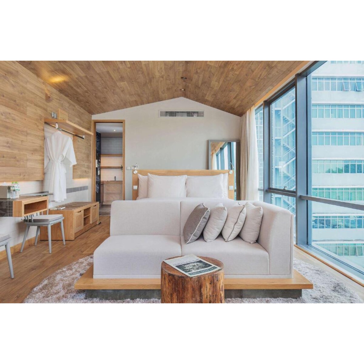 Fusion Suites Saigon - Tap to explore photos