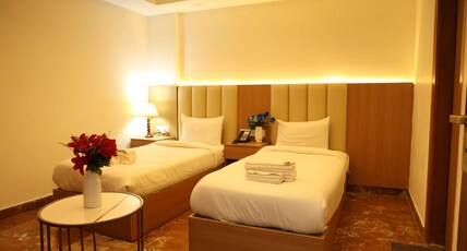 Royal Raven Hotel & Banquet Greater Noida Nearby India Expo Centre & Mart Room Type - Standard Twin Room