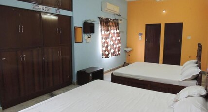 Hotel Radha Party Hall Room Type - Deluxe Family Six Bedroom Ac