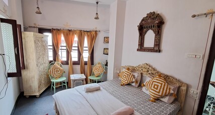 Raahi Backpacker's Hostel |Rooftop Restaurant at Lake Pichola| Room Type - Deluxe Double Bed Room