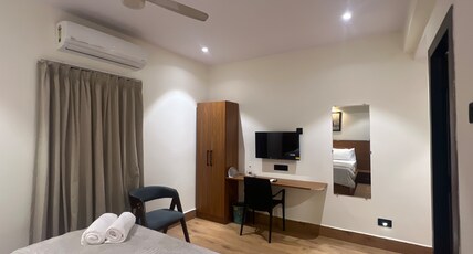 SURYA RESIDENCY Room Type - Deluxe Room