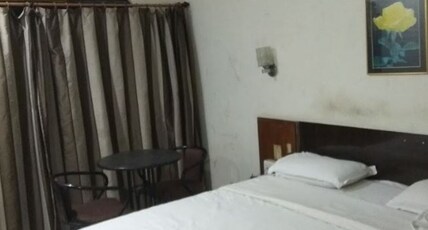 Hotel Shalom International Room Type - Deluxe Room (unmarried / unrelated couples not allowed)