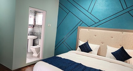 TAVISHA RIVER VIEW ORCHARD Room Type - DELUXE VALLEY VIEW