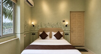White Nest Stays, Udaipur Room Type - Deluxe Room with Lake View