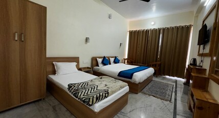 Samrat Inn Room Type - Deluxe Triple Room