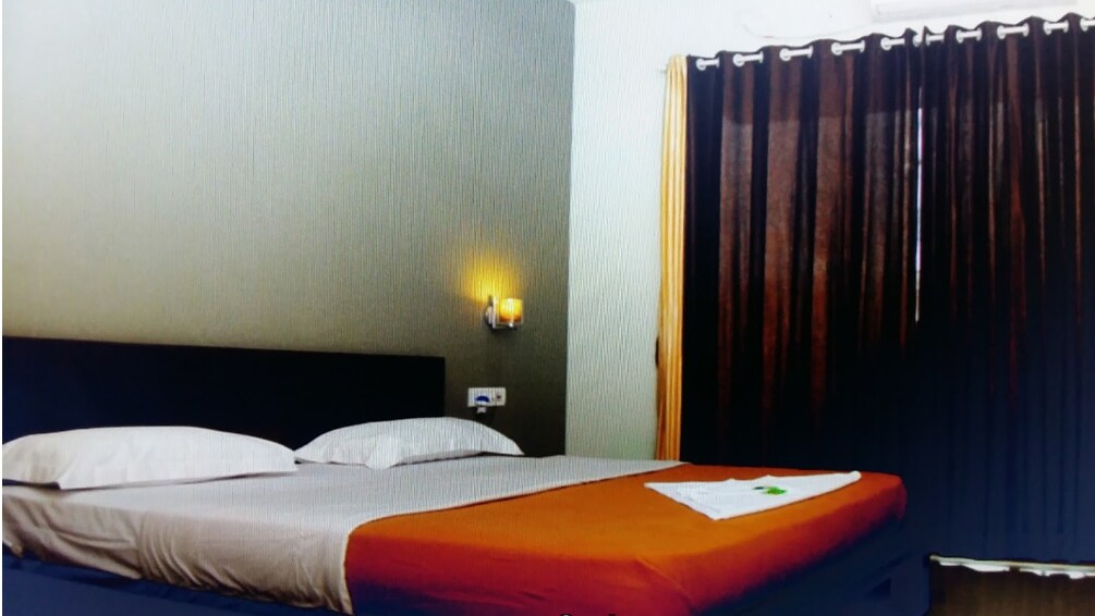 Hotel Roshni - Tap to explore photos