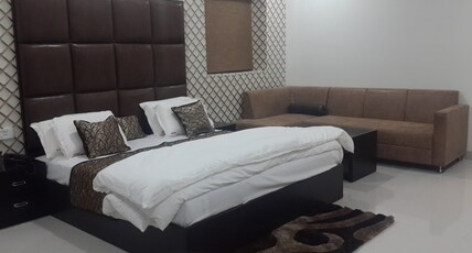Hotel Mandakini Lush Room Type - Luxury room
