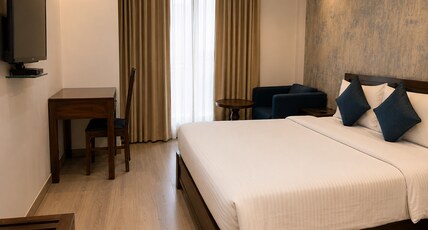 Vrindavan Guest House Room Type - Deluxe Room with Landmark View