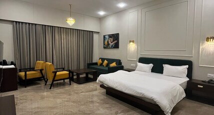 Ayush Gram Hotel and Wellness Resort Room Type - Luxury Room with Balcony and Garden View Ayush Gram Hotel and Wellness Resort Room Type - Luxury Room with Balcony and Garden View