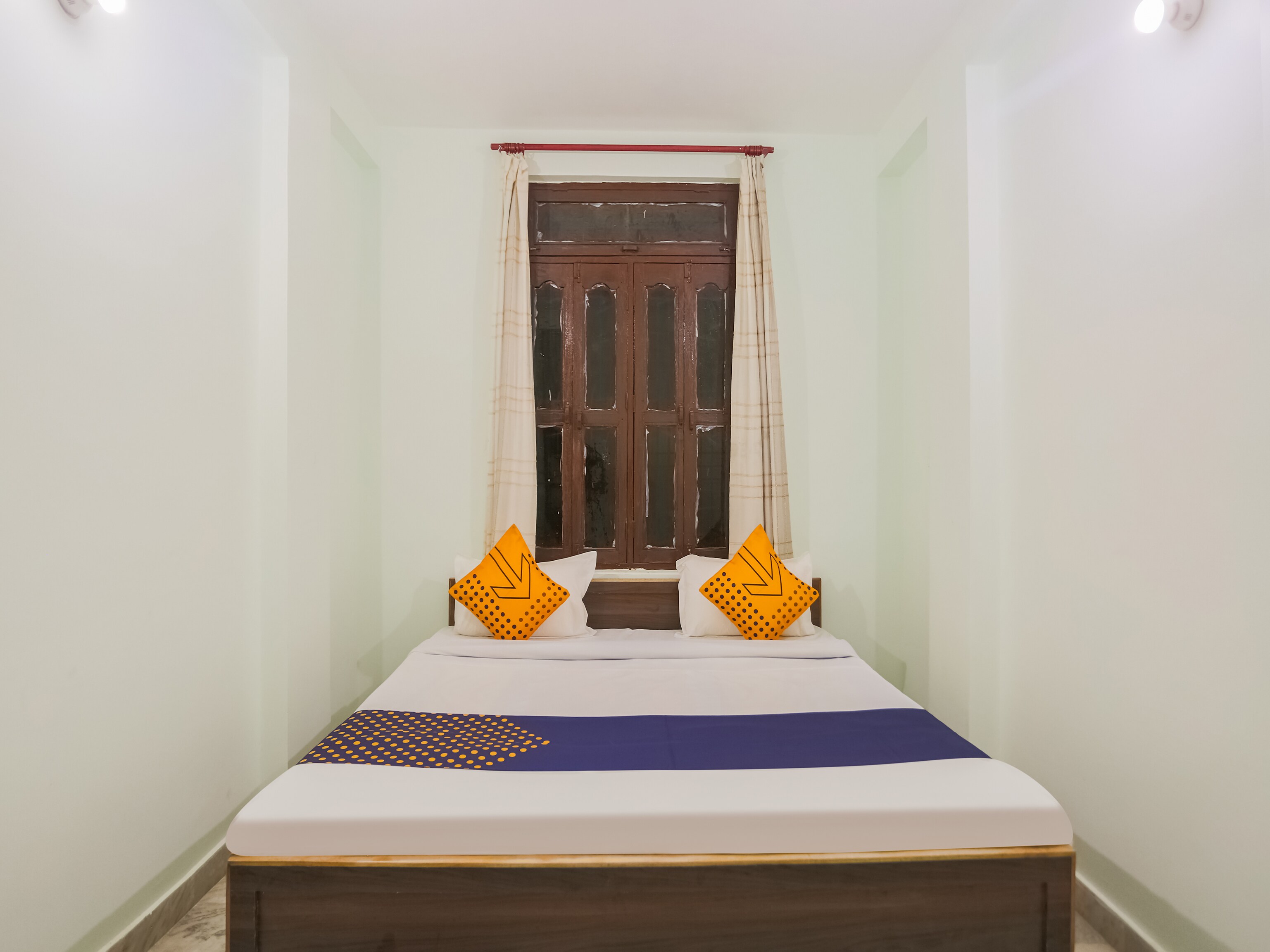 SPOT ON Sukanya Guest House - Tap to explore photos