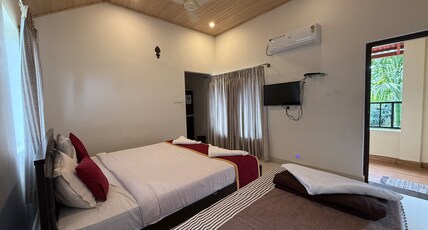 Chirooss Homestay | Dorms & Rooms Room Type - AC Three Bed Deluxe With Balcony.