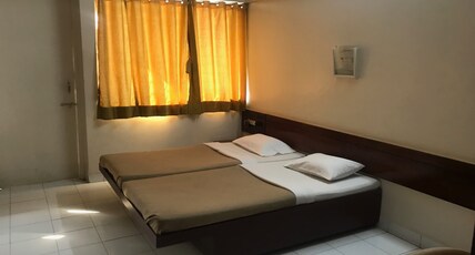 Maurya Residency Room Type - Deluxe Room AC