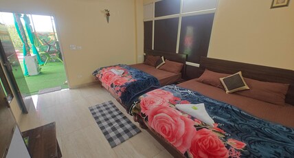 Ghai's Sunrise Room Type - Twin Double beds room