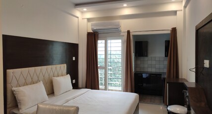 The Grace | A Luxury Accommodation | 500 Mtrs From AIIMS Room Type - Deluxe Bed Room with Balcony and Working desk The Grace | A Luxury Accommodation | 500 Mtrs From AIIMS Room Type - Deluxe Bed Room with Balcony and Working desk