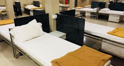 Balaji AC Dormitory Room Type - 1 bed in an AC male Dormitory with shared bathroom