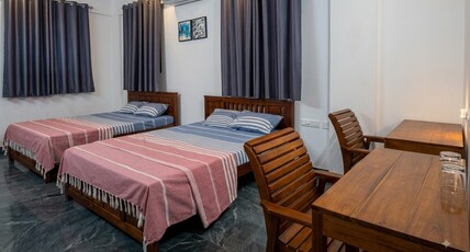 OCEAN PEARL RESIDENCY PERAVOOR Room Type - DELUXE ROOM