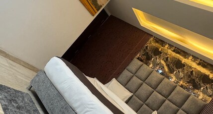 The Bed & Rock Room Type - Deluxe Room  With Balcony