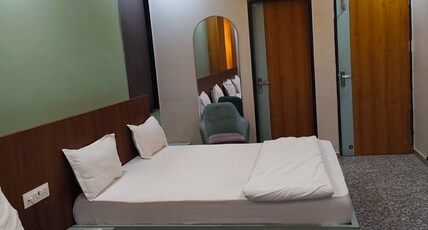 HOTEL DWARKADHISH Room Type - AC Family Room (2 king Bed)