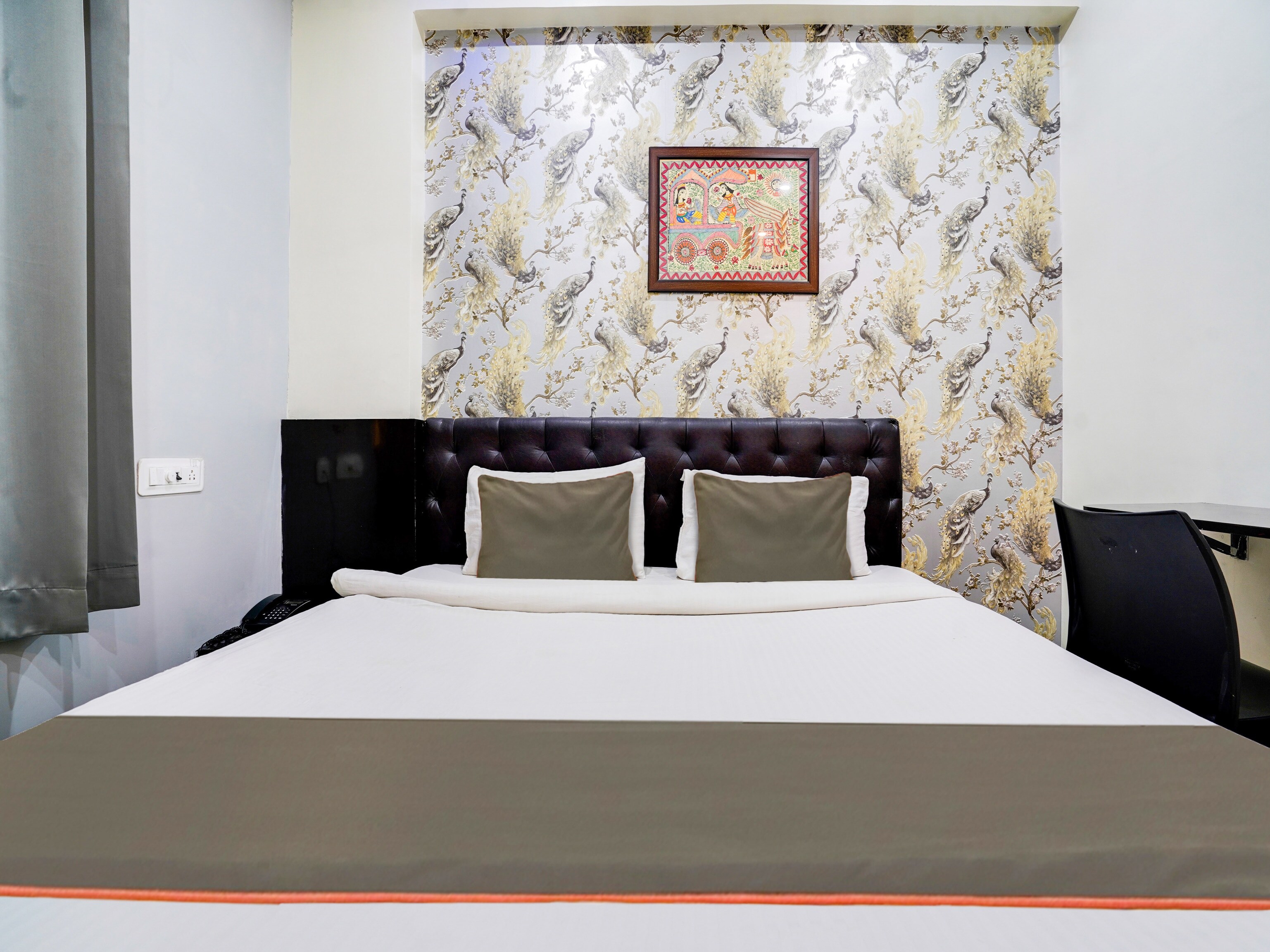 Hotel O Blue Iris A Grandure. - Tap to explore photos