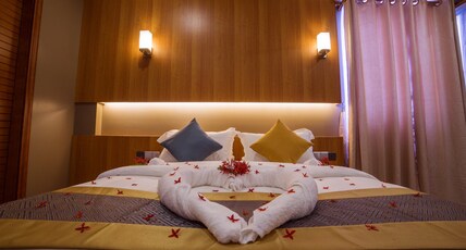 Kuredhi Beach Inn Room Type - DELUXE DOUBLE ISLAND VIEW WITH BALCONY Kuredhi Beach Inn Room Type - DELUXE DOUBLE ISLAND VIEW WITH BALCONY