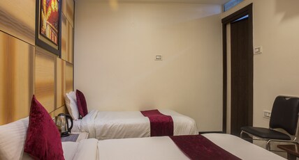 RAJ SUPREME RESIDENCY Room Type - Supreme Deluxe Twin Bed