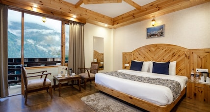 Snow Paradise - Pure Veg Hotel Room Type - Premium Room with Balcony Snow Paradise - Pure Veg Hotel Room Type - Premium Room with Balcony