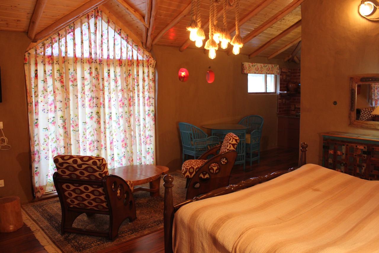 Yoga Croft Mud Cottages - Tap to explore photos