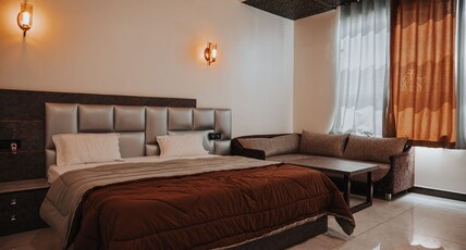 HOTEL PARTY HOUSE BY 100 BLU Room Type - AC SUPER DELUXE