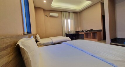 Anandam Homestay Room Type - Family room with Twin Double beds